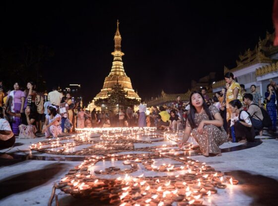 Buddhist devotees light earthern lamps at Botahtaung Pagoda to mark the full moon day of the Thadingyut festival.
