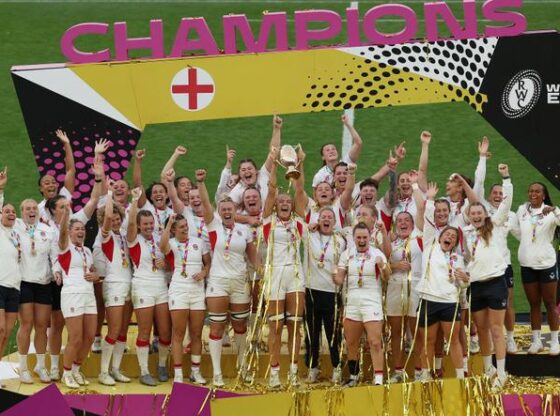 England lift the winners' trophy following the Women’s Rugby World Cup final between Canada and England at Twickenham, on September 27, 2025