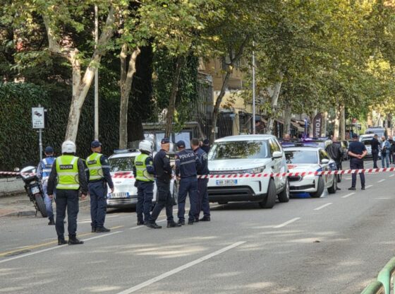 Police officers at the scene of a judge's murder in Tirana, Albania.