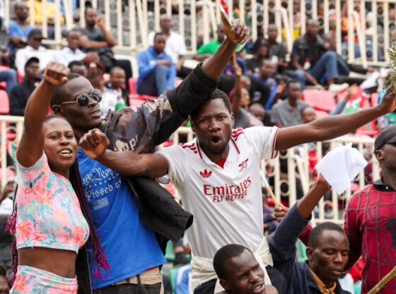 People react during the funeral service of Kenya's former Prime Minister Raila Odinga at Nyayo Stadium in Nairobi, Kenya, October 17, 2025. REUTERS/Monicah Mwangi
