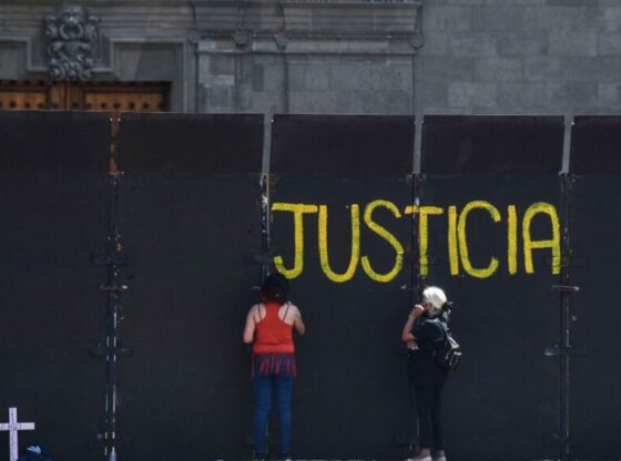 Metal fences guard the National Palace prior to the feminist mobilizations on March 8