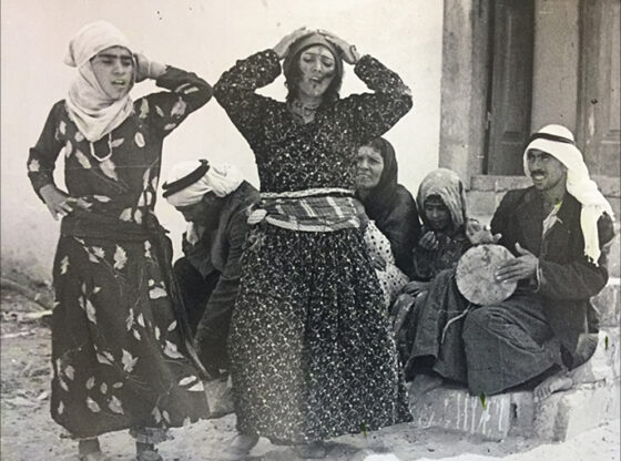 Jerusalem - near Damascus Gate - a group of the Dom clan celebrating a wedding in 1920 - photographed by Juman Abu Arafa from the archive of the Al-Domari Center - Al Jazeera Net