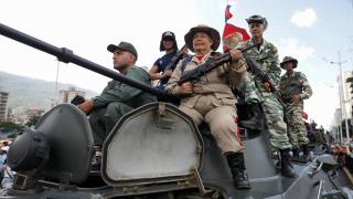 The Bolivarian National Militia of Venezuela marches in support of President Nicolás Maduro.