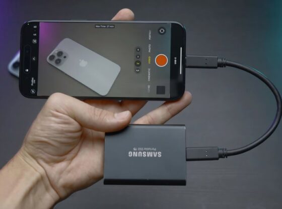 China, Beijing - September 15, 2023: External drive for phone. Action. External memory card for new iPhone 15 pro. External storage disk for shooting videos and photos in new iPhone; Shutterstock ID 2392651619; purchase_order: aj; job: ; client: ; other: