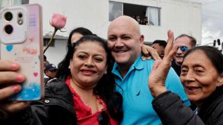 Diego Borja, vice presidential candidate, takes a selfie at a rally by Luisa González, presidential standard bearer of the Citizen Revolution party, as she begins her campaign for the elections, in Quito, on January 5, 2025.
