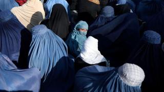 Women wear burkas due to regime imposition
