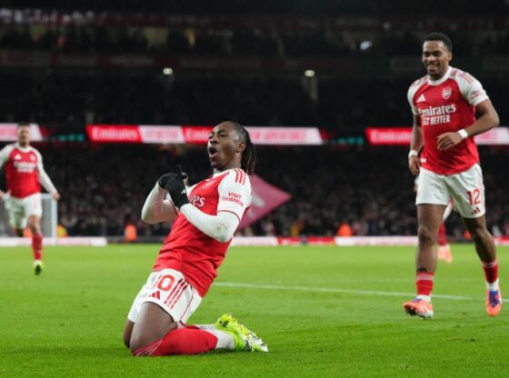 Arsenal's Eberechi Eze celebrates after scoring during a Premier League soccer match between Arsenal and Tottenham in London, Sunday, Nov. 23, 2025. (AP Photo/Frank Augstein)