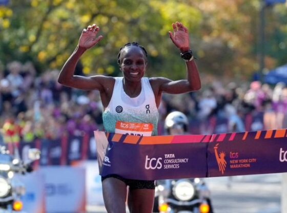 Kenya's Hellen Obiri crosses the line to win the women's New York CIty Marathon, November 2, 2025.