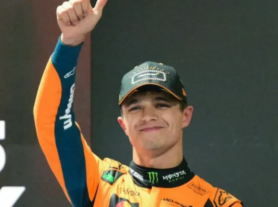 British McLaren driver Lando Norris gestures after taking pole position during the qualifying session of the Las Vegas Formula One Grand Prix