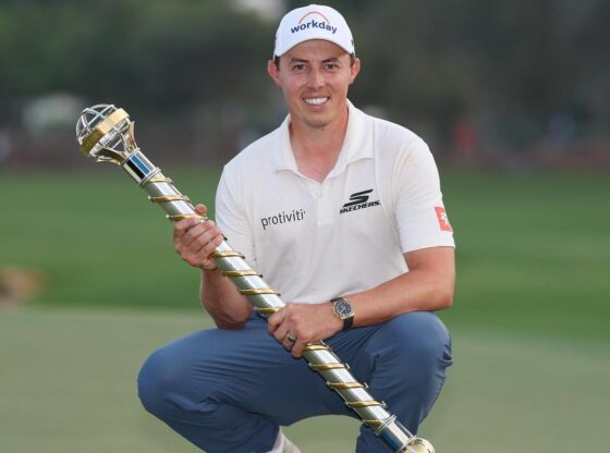 Fitzpatrick poses with the champion title at the DP World Tour Championship