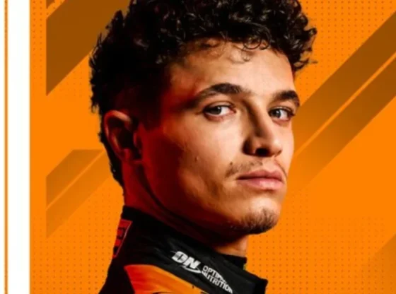 Lando Norris celebrates after taking pole position during the qualifying session of the Sao Paulo Formula One Grand Prix at the José Carlos Pace circuit