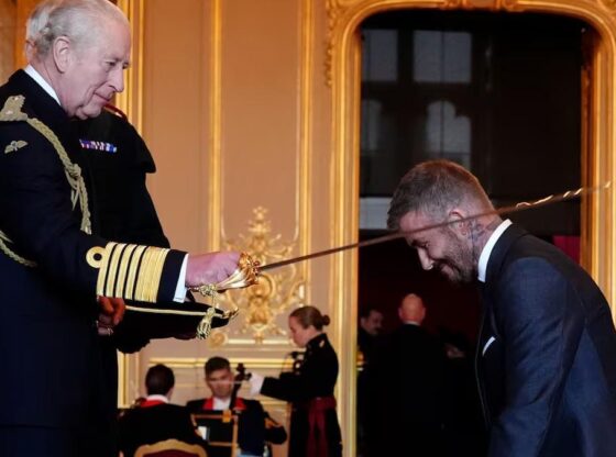 David Beckham is knighted by the English king, Charles III.