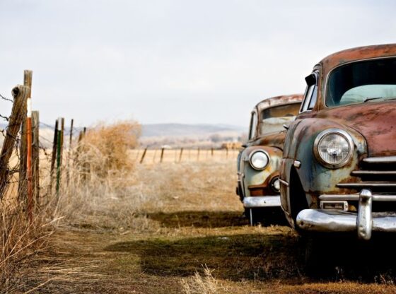 vintage cars abandoned and rusting away in rural wyoming