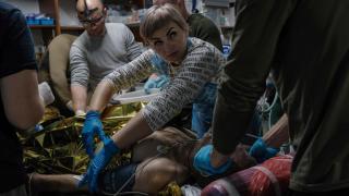 The medical team of the stabilization point of the 14 Chervona Kalyna Brigade treats a wounded Ukrainian soldier on the Pokrovsk front.
