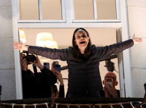 Nobel Peace Prize laureate Maria Corina Machado reacts from a balcony of Grand Hotel, after her daughter Ana Corina Sosa Machado, accepted the award on her behalf, in Oslo, Norway December 11, 2025. REUTERS/Leonhard Foeger TPX IMAGES OF THE DAY